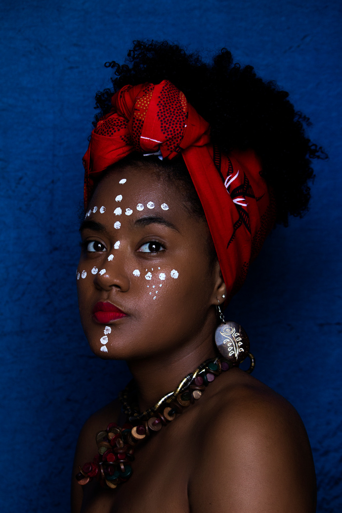 Portrait of Woman in African Makeup and Accessories